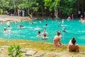 Tourists enjoy vacation travel in summer at natural emerald pool at Krabi