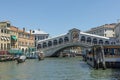 Tourists enjoy the view from Rialto bridge to grand canal on a sunny day in the old quarter San Polo in Venice, Italy Royalty Free Stock Photo