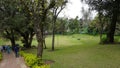 Tourists enjoying the beautiful kodaikanal Bryant park Royalty Free Stock Photo