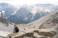 Tourists enjoying the beautiful scenery of Canadian Rockies landscape. Sentinel Pass. Banff National Park, Alberta, Canada.