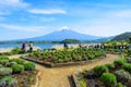 Tourists enjoying mount Fuji view from Oishi park at the Lake Kawaguchiko Japan