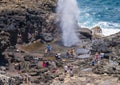 Tourists enjoying the Nakalele Blowhole on the Island of Maui.