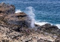 Tourists enjoying the Nakalele Blowhole on the Island of Maui.