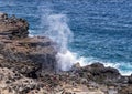 Tourists enjoying the Nakalele Blowhole on the Island of Maui.