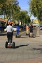 Tourists enjoying a sightseeing tour on segways