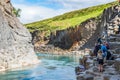 Tourists enjoying the stunning view of Studlagil canyon in Jokuldalur in east Iceland