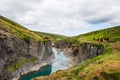 Tourists enjoying the stunning view of Studlagil canyon in Jokuldalur in east Iceland