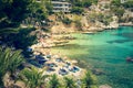 Tourists enjoying summer holiday on the calla Fornells in Mallorca, spain