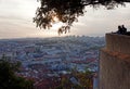 Tourists enjoying the sunset over the Historic City Centre of Lisbon from the top of Saint George Castle Castelo de SÃÂ£o Jorge Royalty Free Stock Photo