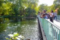 Tourists enjoying their time at St James`s Park Lake in St James`s Park, London, England, UK
