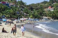 Tourists enjoying the tranquility of Sayulita Beach