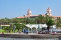 Tourists enjoying vacation along the promenade Paseo de las Meloneras at the beach. Maspalomas, Canary Islands - July 18 2017. Royalty Free Stock Photo