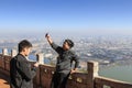 Tourists enjoying the view of Kunming, the capital of Yunnan province in Southern China, from XiShan Western Hill Royalty Free Stock Photo