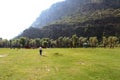 Tourists enjoying a walk in the beautiful Betaab Valley in Pahalgam, Kashmir