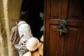 Tourists enter door knocker of old Bran castle Royalty Free Stock Photo
