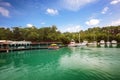 Unrecognisable Tourists in exotic Marigot Bay, located on the west coast of the Caribbean island of St