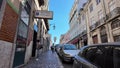 Tourists experiencing Lisbons streets and historic landmarks.