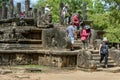 Tourists at the Audience Hall at Polonnaruwa in Sri Lanka.