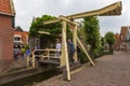 Tourists explore the small town of Volendam, on the Markermeer Lake Royalty Free Stock Photo