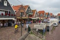 Tourists explore the small town of Volendam, on the Markermeer Lake Royalty Free Stock Photo