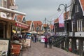 Tourists explore the small town of Volendam, on the Markermeer Lake Royalty Free Stock Photo