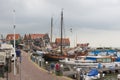 Tourists explore the small town of Volendam, on the Markermeer Lake Royalty Free Stock Photo