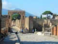 Tourists exploring ancient Roman ruins