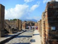 Tourists exploring historical Roman ruins