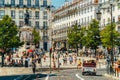 Tourists exploring square of Luis de Camoes in Lisbon