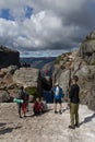 Tourists at the famous boulder Kjeragbolten, Norway