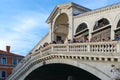 Tourists are on famous Rialto Bridge on Grand Canal, Venice, Italy Royalty Free Stock Photo