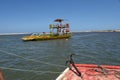 Tourists on a ferry at Barra de Cunhau on Brazil