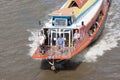 Tourists ferry sightseeing along Chao Phraya River.