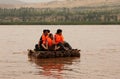 Tourists floating along the Yellow River Huang He on a sheepskin rafts