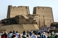 Tourists flock towards the Temple of Horus in Edfu, Egypt.