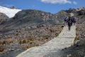 Tourists following the path to Pastoruri Glacier, at Huascaran National Park, Huaraz/Peru Royalty Free Stock Photo