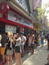 Tourists form long lines to buy ice cream