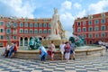 Tourists at Fountain Sun Fontaine du Soleil on Place Massena, Nice, Cote d`Azur, France Royalty Free Stock Photo