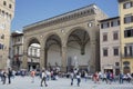 Tourists in front of the Loggia dei Lanzi Royalty Free Stock Photo