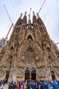 Tourists in front of the Nativity FaÃÂ§ade of Sagrada Familia in Barcelona