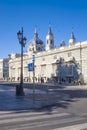 Tourists in front of the Royal Palace seen from the historical Plaza de Oriente square in the centre of Madrid Spain Royalty Free Stock Photo