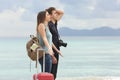 Tourists frustrated with the bad weather on the beach