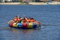 Tourists on a fun boat at Barra de Cunhau on Brazil