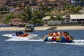 Tourists on a fun boat at Barra de Cunhau on Brazil