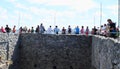 Tourists on gallery of donjon tower