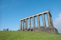 Tourists gather at the National Monument of Scotland during summer on Calton Hill, Edinburgh, Scotland Royalty Free Stock Photo