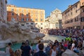 Tourists gather at the Trevi Fountai in Rome, Italy