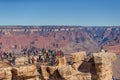 Tourists gathering at Mather Point to look at the Grand Canyon in Arizona, USA