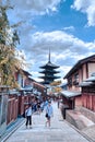 Tourists in Gion district with Yasaka pagoda in background Royalty Free Stock Photo