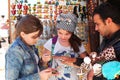 Tourists girls bue souvenirs on egyptian oriental market